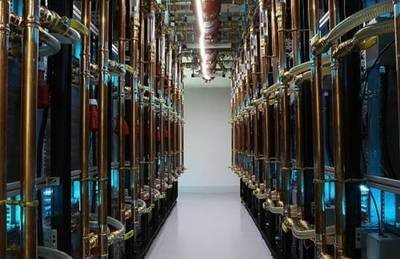 Expansive Ethereum mining farm with rows of active mining rigs